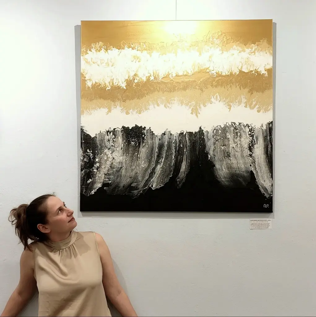 Black beach covered in gold